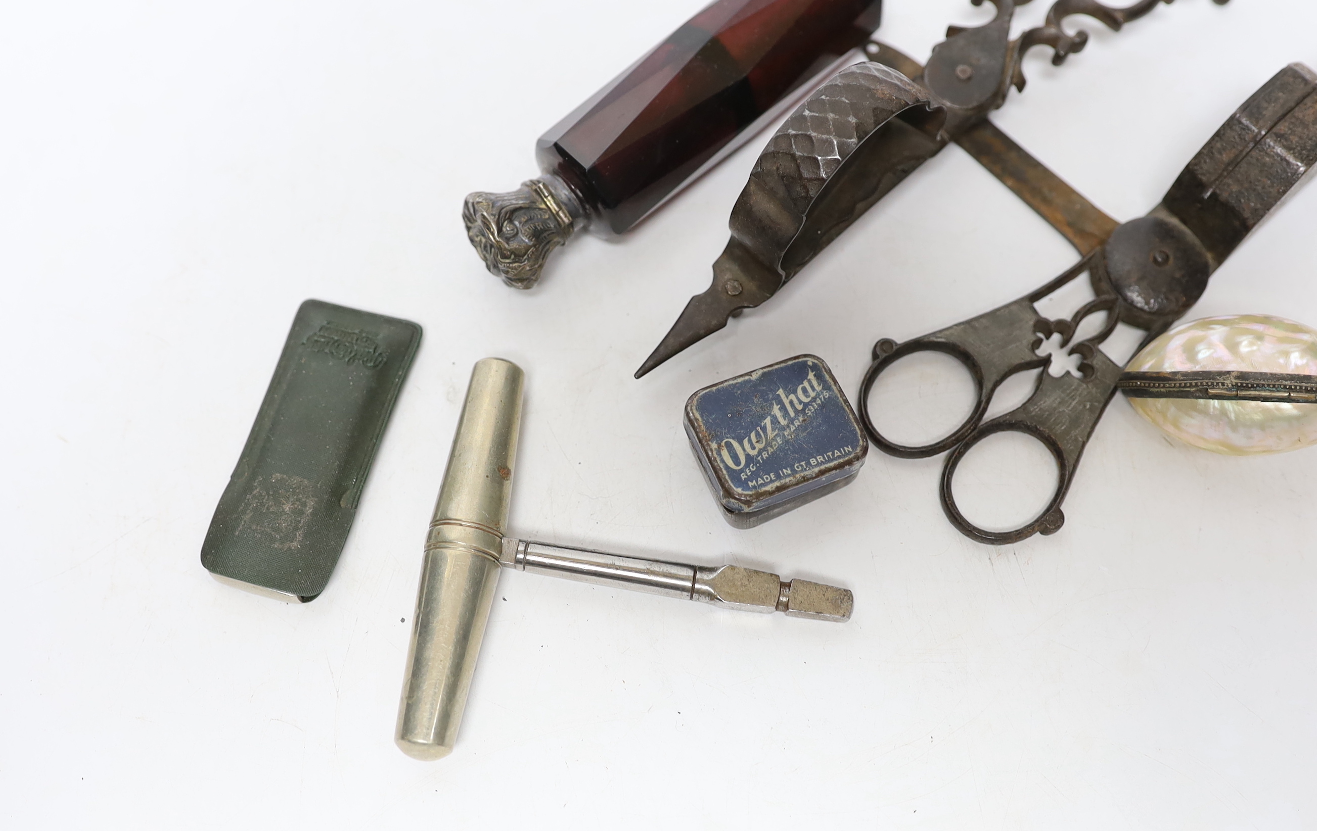 A quantity of mixed collectables including candle snuffers etc.